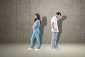 Composite image of upset couple not talking to each other after fight Royalty Free Stock Photo