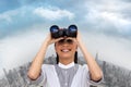 Composite image of visionary businesswoman looking through binoculars Royalty Free Stock Photo