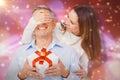 Composite image of wife covering eyes of husband Royalty Free Stock Photo