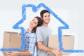 Composite image of wife and husband carrying boxes in their new house