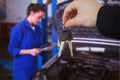 Composite image of woman smiling while receiving car keys Royalty Free Stock Photo