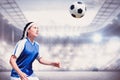 Composite image of woman soccer player waiting the ball