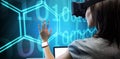 Composite image of woman using a virtual reality device Royalty Free Stock Photo