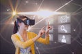 Composite image of woman using virtual reality Royalty Free Stock Photo