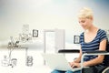 Composite image of woman in wheelchair using computer Royalty Free Stock Photo