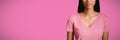 Composite image of women in pink standing for breast cancer