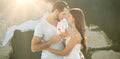 Composite image of young couple embracing each other Royalty Free Stock Photo
