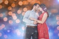 Composite image of young couple looking at each other and embracing Royalty Free Stock Photo