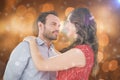 Composite image of young couple looking at each other and embracing Royalty Free Stock Photo