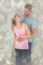 Composite image of young couple painting with roller Royalty Free Stock Photo