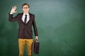 Composite image of young geeky businessman holding briefcase Royalty Free Stock Photo