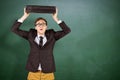 Composite image of young geeky businessman holding briefcase Royalty Free Stock Photo