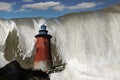 Composite of Lighthouse and tidal wave Royalty Free Stock Photo