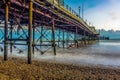 A composite, long exposure view under the pier at Worthing, Sussex just before sunset Royalty Free Stock Photo