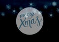 Composite of merry xmas text over snow falling on blue background Royalty Free Stock Photo