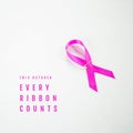 Composite of this october every ribbon counts text and pink awareness ribbon on white background