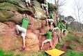 Composite image of a man rock climbing outdoors