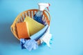 Composition with accessories for home cleaning and keeping clean in a basket Royalty Free Stock Photo