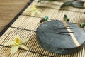 Composition with acupuncture needles on bamboo mat Royalty Free Stock Photo