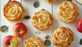 Composition with apple roses from puff pastry on wooden table Royalty Free Stock Photo