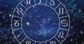 Composition of aries star sign symbol in spinning zodiac wheel over glowing stars