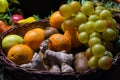 Composition with assorted fruits in wicker basket Royalty Free Stock Photo