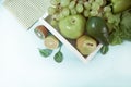 Composition with assorted raw organic green vegetables and friuts on the white wooden tray. Top view. Copy space Royalty Free Stock Photo