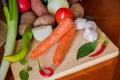 Composition with assorted raw organic vegetables. Detox diet, garlic and peppers. Royalty Free Stock Photo
