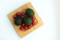 Composition of avocado and cherry tomatoes Royalty Free Stock Photo