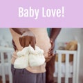 Composition of baby love text over african american pregnant woman holding booties Royalty Free Stock Photo