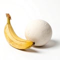 Composition with banana and plaster sphere on white background Royalty Free Stock Photo
