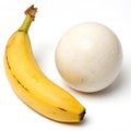 Composition with banana and plaster sphere on white background Royalty Free Stock Photo