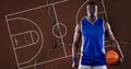 Composition of basketball player holding ball over basketball court and cracked surface