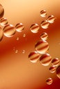 Oil drops on water colors red yellow Royalty Free Stock Photo