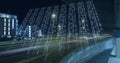 Composition of binary coding over cityscape at night Royalty Free Stock Photo