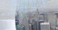 Composition of binary coding over modern office cityscape background Royalty Free Stock Photo