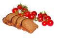Composition of black bread and cherry tomatoes Royalty Free Stock Photo