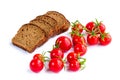 Composition of black bread slices and cherry tomatoes Royalty Free Stock Photo