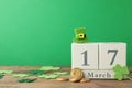 Composition with block calendar on table, space for text. St. Patrick`s Day celebration Royalty Free Stock Photo