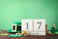 Composition with block calendar on table, space for text. St. Patrick`s Day celebration Royalty Free Stock Photo