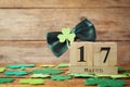 Composition with block calendar on wooden table, space for text. St. Patrick`s Day celebration Royalty Free Stock Photo