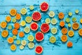 Citrus fruits orange, lemon, grapefruit, mandarin, lime on blue background Royalty Free Stock Photo