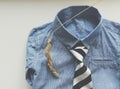 Composition with blue shirt, tie Royalty Free Stock Photo