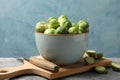 Composition with bowl of brussels sprout on table, close up Royalty Free Stock Photo