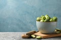 Composition with bowl of brussels sprout on table, space for text Royalty Free Stock Photo