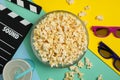 Composition bowl of popcorn on multicolor background
