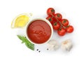 Composition with bowl of tomato sauce and vegetables isolated on white Royalty Free Stock Photo
