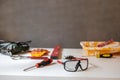 Cordless electric drill, gloves, pencil and construction tools on table Royalty Free Stock Photo