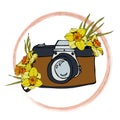 The composition of the camera and a bouquet of daffodils