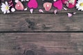 Composition with candles, flowers and hearts on dark rustic wood Royalty Free Stock Photo